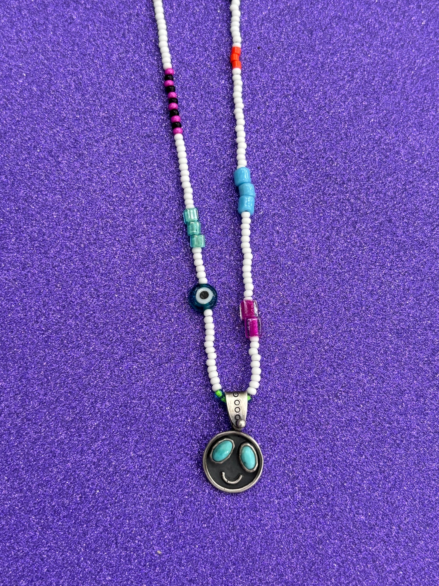 Turquoise Smiley Face