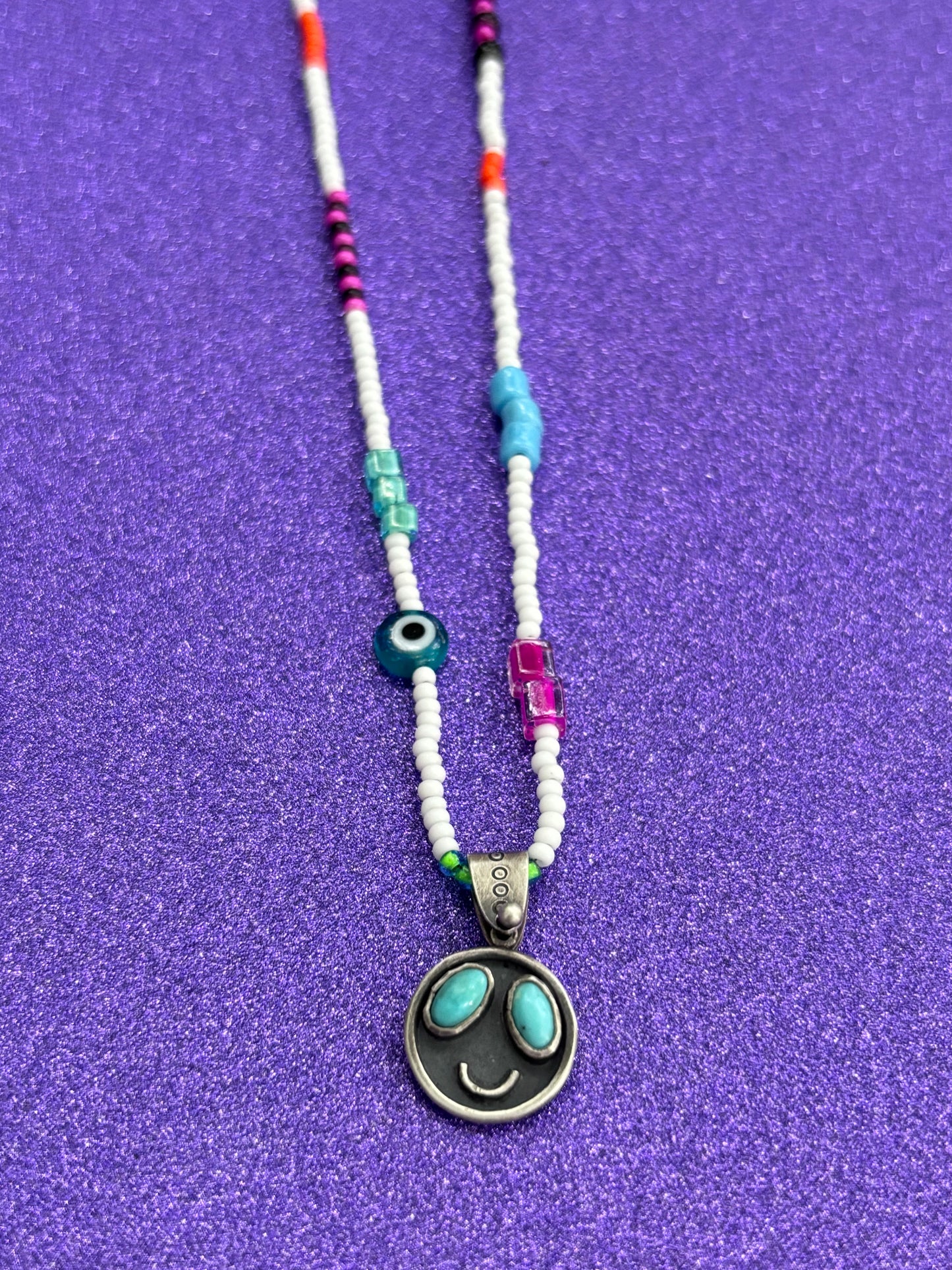 Turquoise Smiley Face
