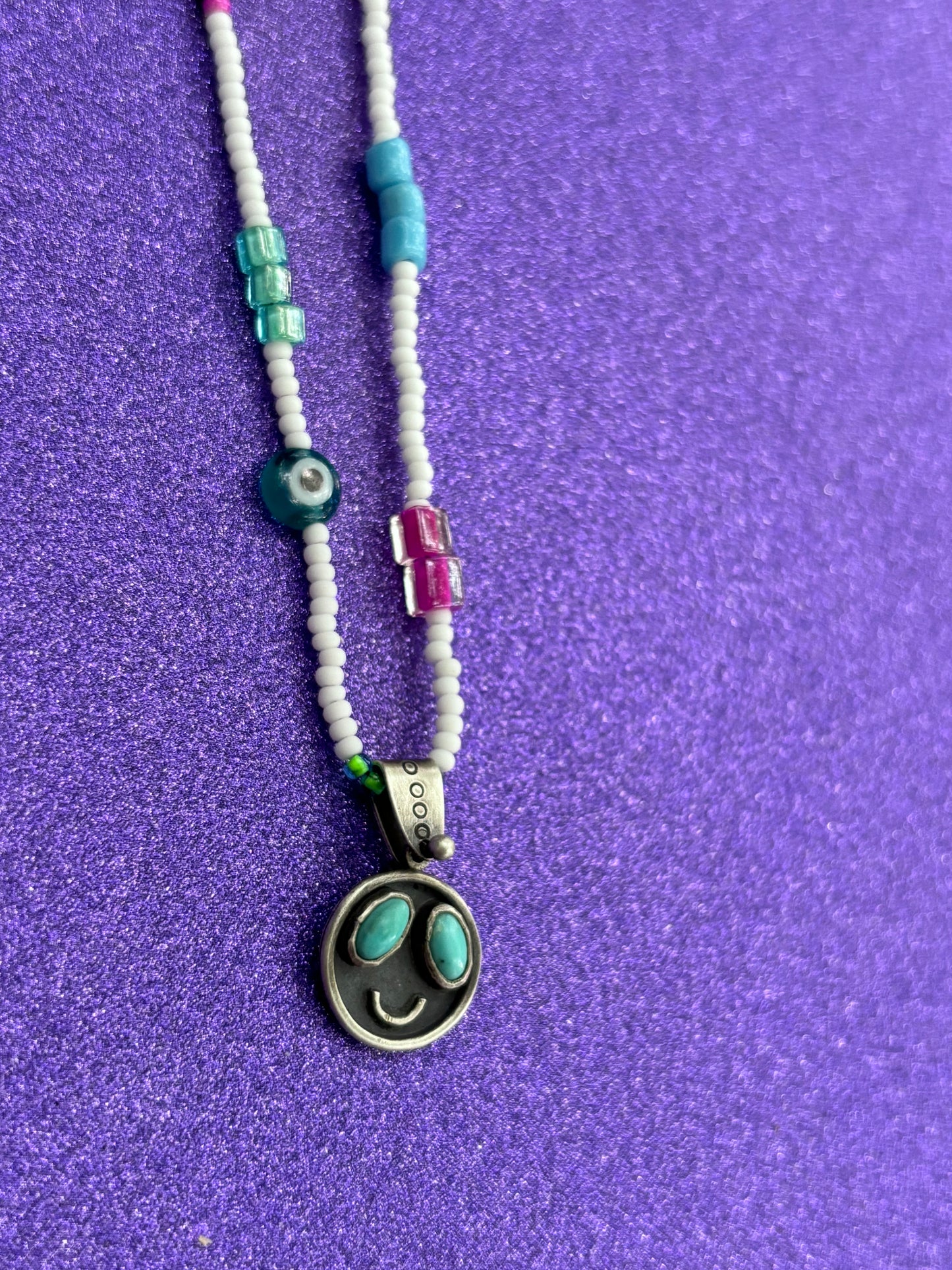 Turquoise Smiley Face